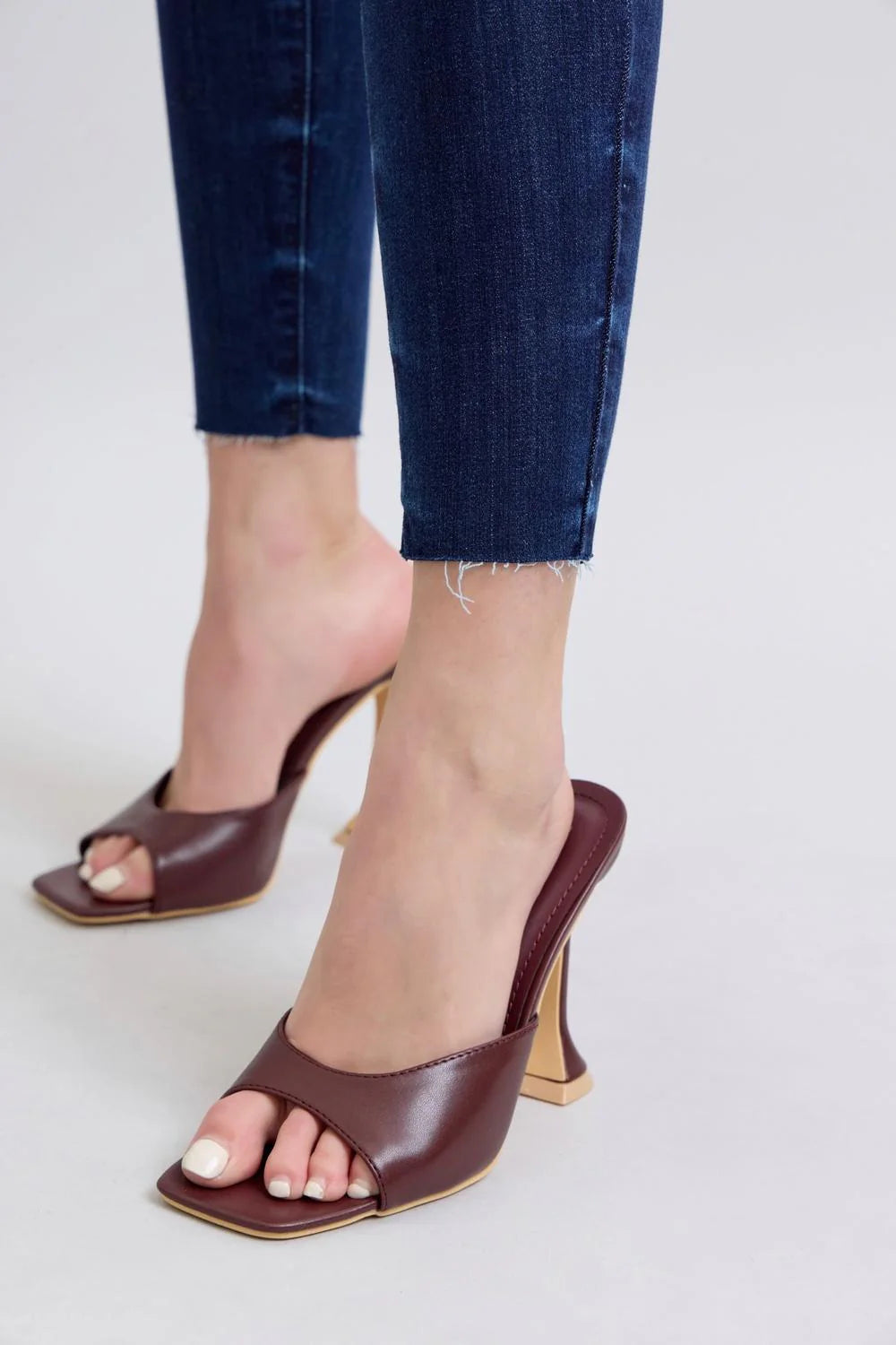 Mid Rise Raw Hem Skinny Denim Jeans