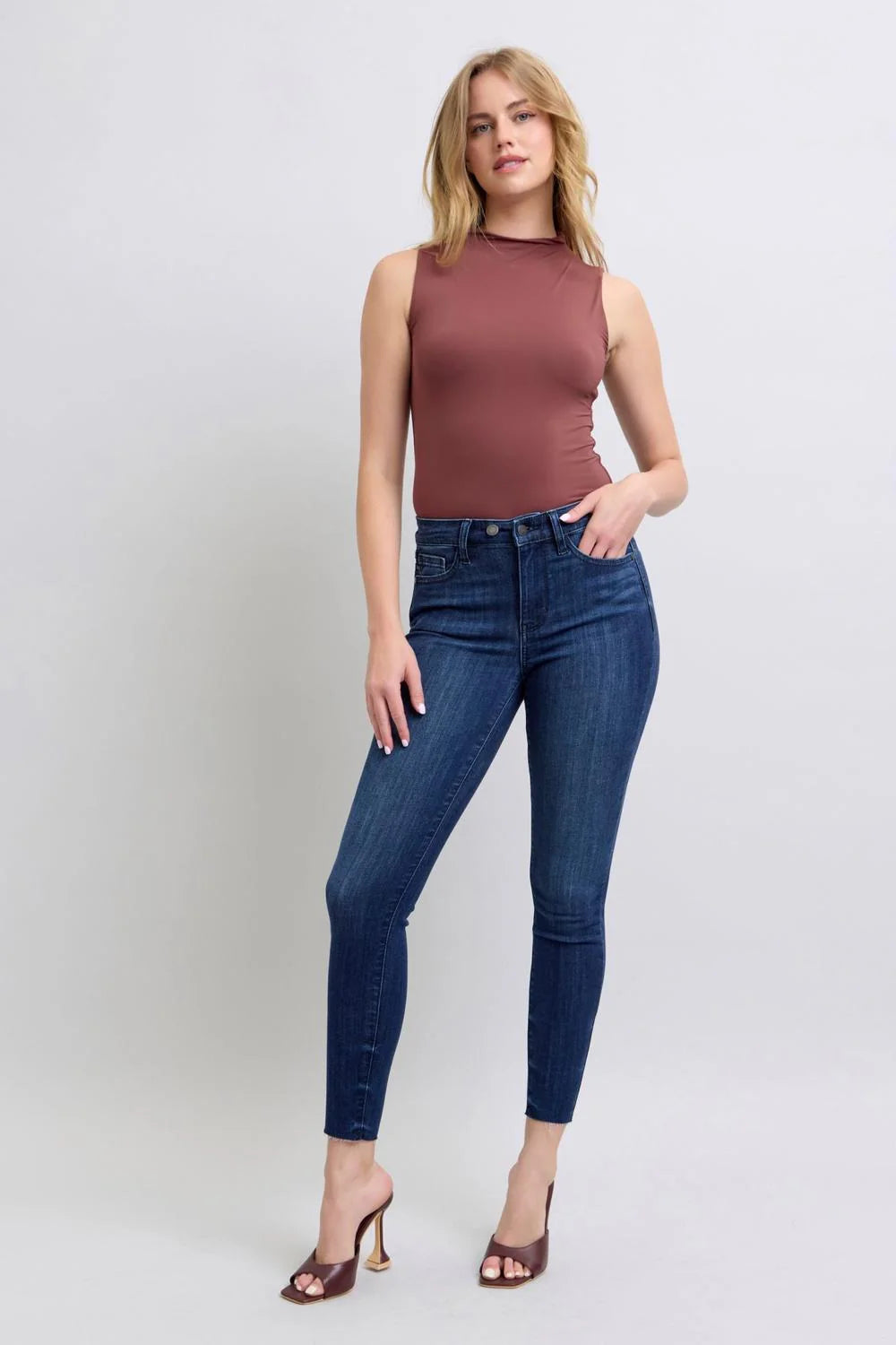 Mid Rise Raw Hem Skinny Denim Jeans